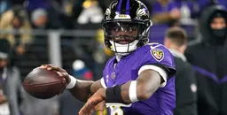Baltimore Ravens quarterback Lamar Jackson warming up for NFL game